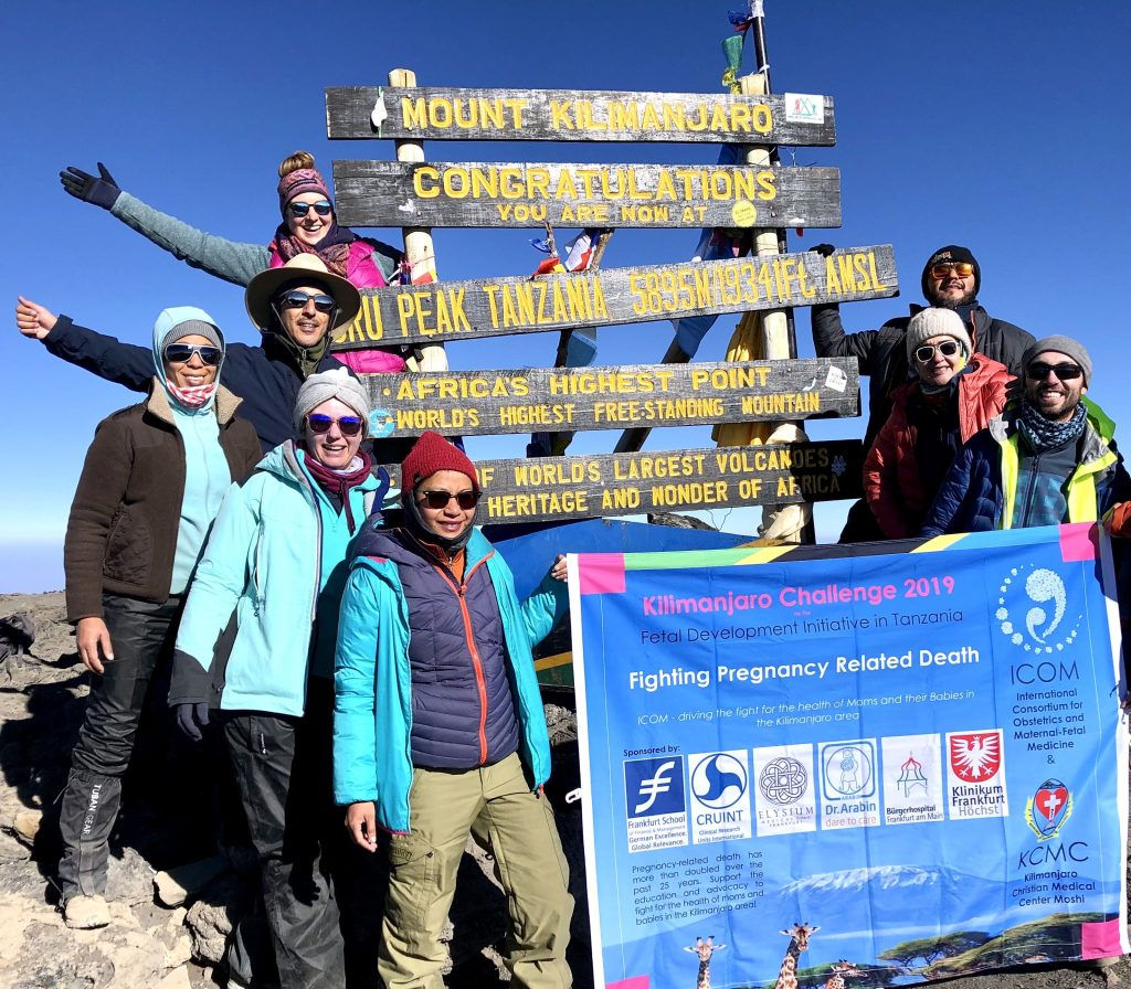 Photo of Akos and colleagues on top of mountain